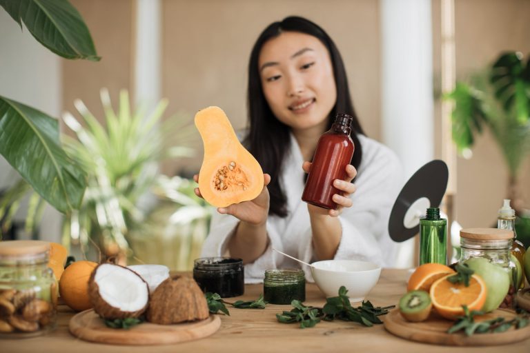 beautiful-healthy-asian-woman-holding-pumpkin-and-2024-12-13-04-27-16-utc